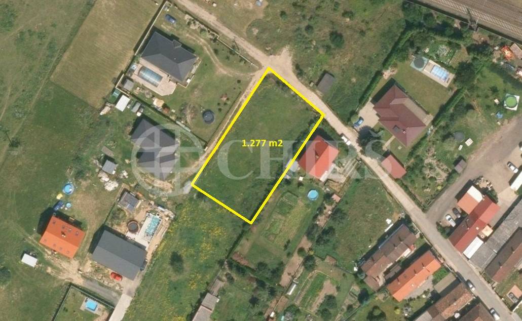 Prodej stavebního pozemku, 1277m², obec Račice u Štětí